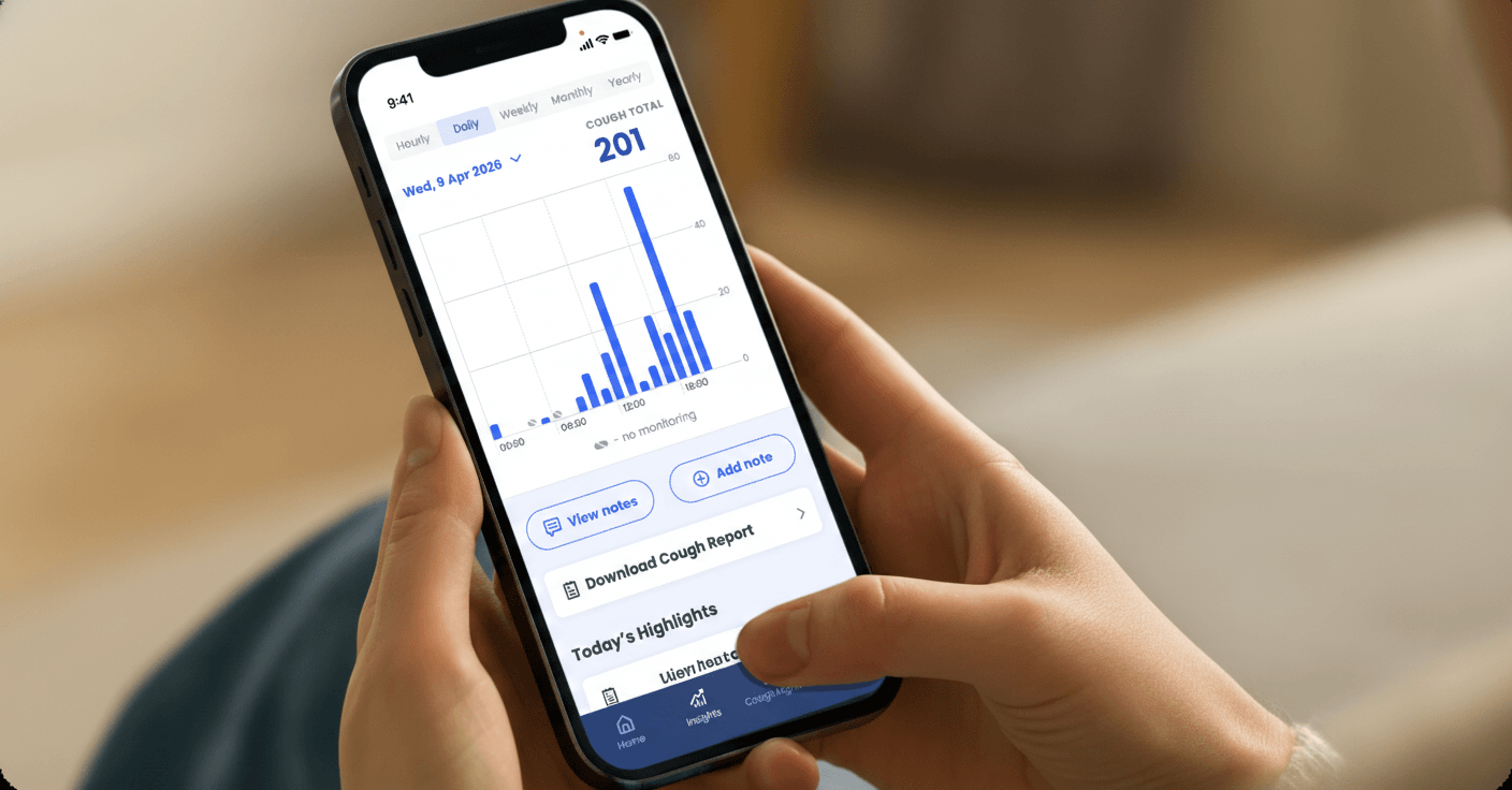 Patient using Hyfe’s digital therapeutic app for chronic cough on a smartphone